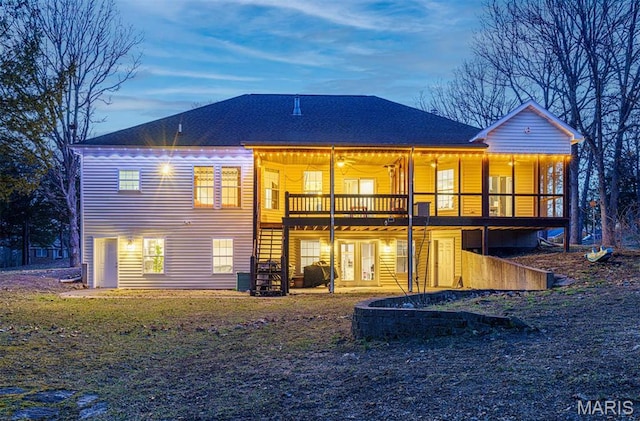 rear view of house featuring a deck, french doors, stairs, and a ceiling fan