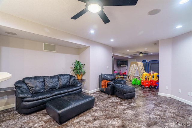 living area with a ceiling fan, baseboards, and recessed lighting