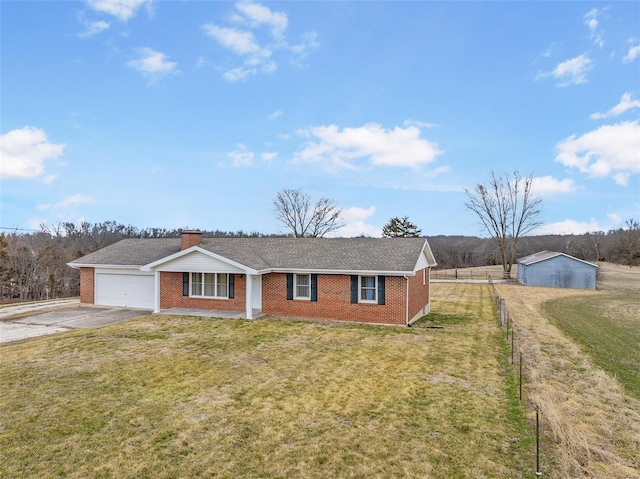 762 Cave Farm Rd, Troy, MO 63379 - ranch-style home featuring concrete driveway, brick siding, a garage, and a chimney