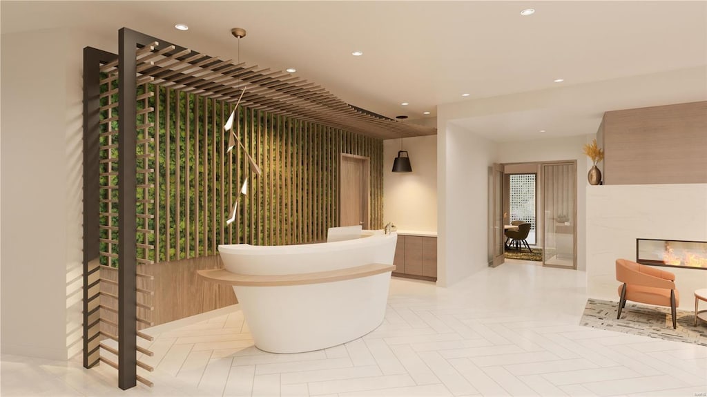 reception area featuring recessed lighting and a fireplace