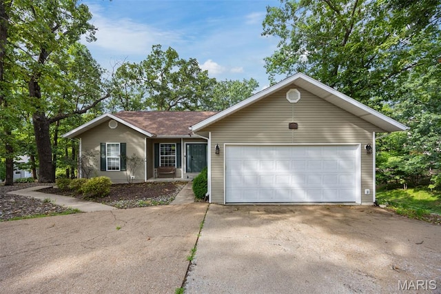 1500 Swiss Village Rd, Osage Beach, MO 65065 - single story home with driveway and a garage