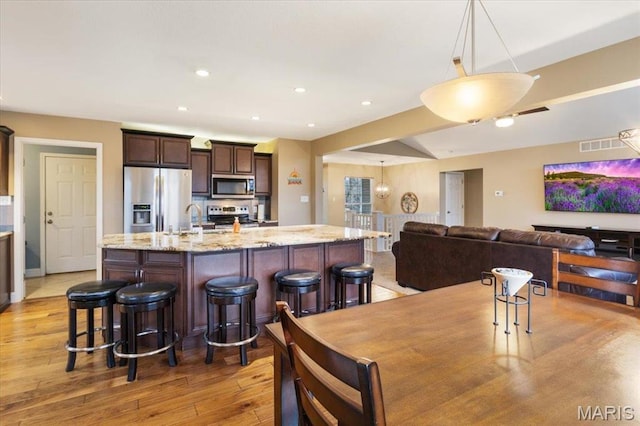 1500 Swiss Village Rd, Osage Beach, MO 65065 - dining space with light wood-type flooring and recessed lighting