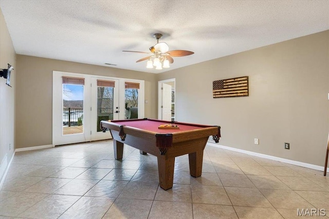 1500 Swiss Village Rd, Osage Beach, MO 65065 - playroom with french doors, ceiling fan, pool table, a textured ceiling, and light tile patterned floors