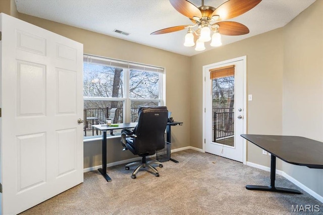 1500 Swiss Village Rd, Osage Beach, MO 65065 - carpeted home office featuring baseboards and ceiling fan