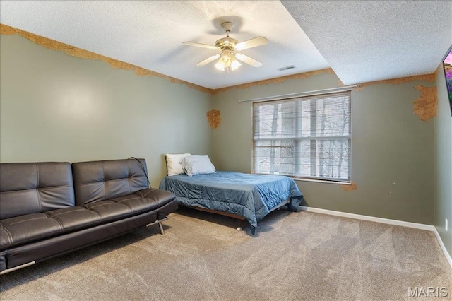1500 Swiss Village Rd, Osage Beach, MO 65065 - bedroom featuring carpet flooring, a textured ceiling, and a ceiling fan