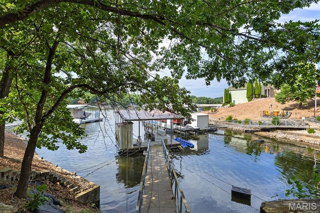 1500 Swiss Village Rd, Osage Beach, MO 65065 - dock featuring a water view and boat lift