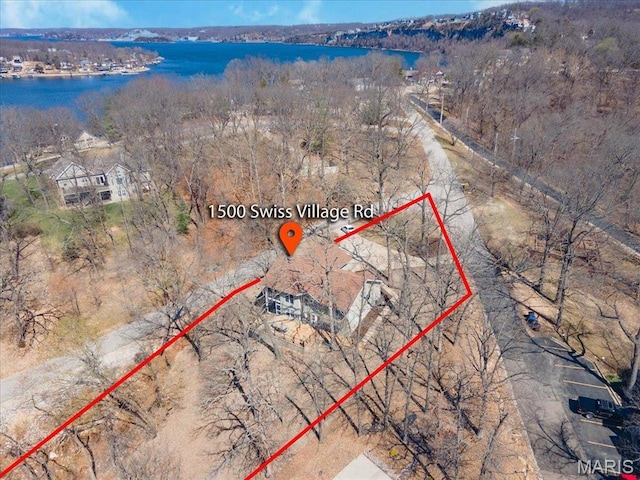 1500 Swiss Village Rd, Osage Beach, MO 65065 - aerial view of property and surrounding area featuring property parcel outlined and a nearby body of water