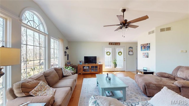 20 Denzel Dr, Greenville, IL 62246 - living room featuring vaulted ceiling, healthy amount of natural light, light wood-type flooring, and a ceiling fan
