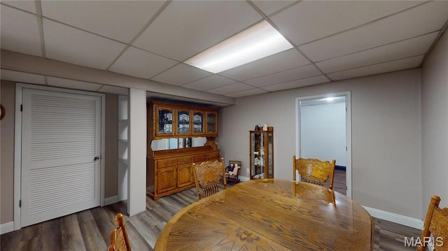 20 Denzel Dr, Greenville, IL 62246 - dining space featuring wood finished floors, baseboards, and a drop ceiling