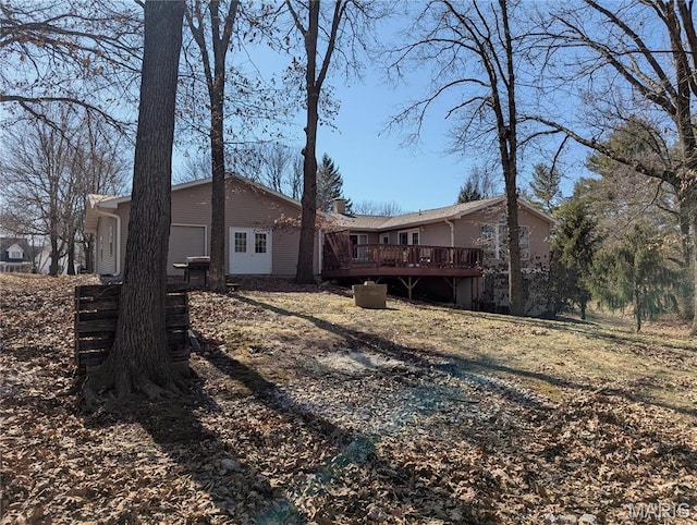 20 Denzel Dr, Greenville, IL 62246 - rear view of house featuring a wooden deck and an attached garage