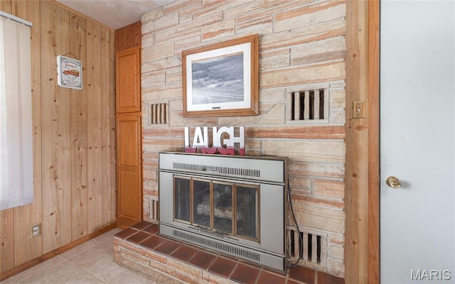 24265 Vinyard Rd, Cuba, MO 65453 - detailed view of wood walls, a glass covered fireplace, and baseboards