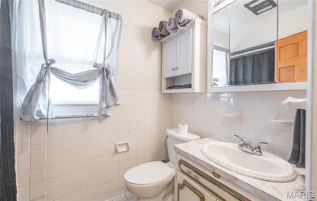 24265 Vinyard Rd, Cuba, MO 65453 - full bathroom with tile walls, toilet, and vanity