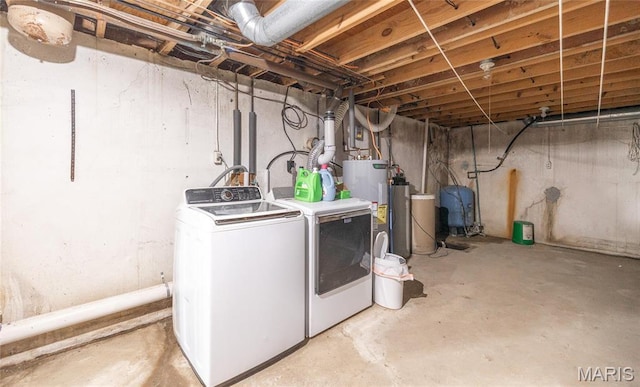 24265 Vinyard Rd, Cuba, MO 65453 - washroom with separate washer and dryer and water heater
