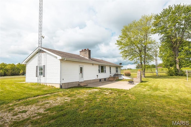 24265 Vinyard Rd, Cuba, MO 65453 - back of property featuring a patio area, a chimney, and entry steps