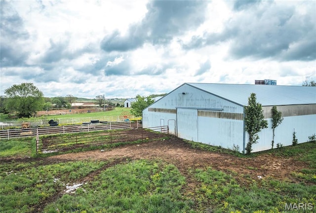 24265 Vinyard Rd, Cuba, MO 65453 - view of pole building with fence and a view of rural / pastoral area