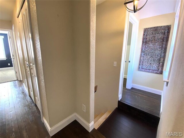 209 E 3rd St, Hermann, MO 65041 - hallway with hardwood / wood-style floors and baseboards