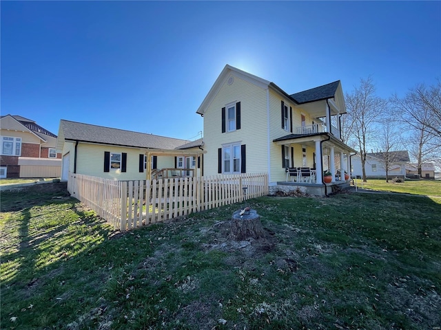 506 E Jefferson St, Perry, MO 63462 - back of house with covered porch and a balcony