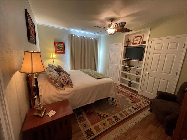 506 E Jefferson St, Perry, MO 63462 - bedroom featuring wood finished floors and a ceiling fan