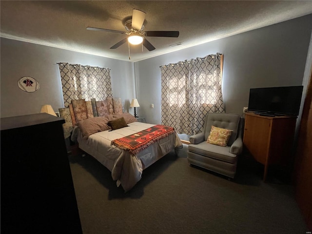 506 E Jefferson St, Perry, MO 63462 - carpeted bedroom with a textured ceiling and a ceiling fan