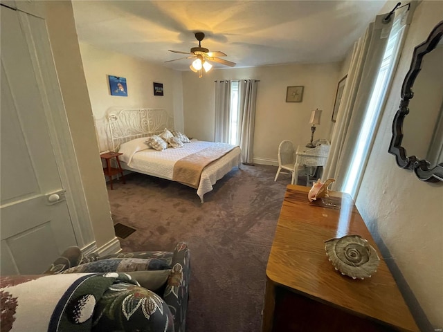 506 E Jefferson St, Perry, MO 63462 - carpeted bedroom featuring baseboards and ceiling fan