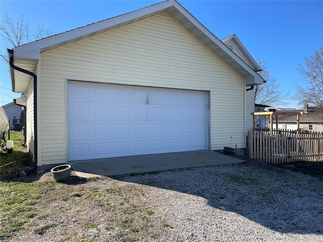 506 E Jefferson St, Perry, MO 63462 - detached garage featuring fence
