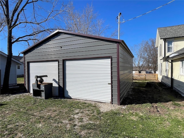 506 E Jefferson St, Perry, MO 63462 - detached garage featuring fence