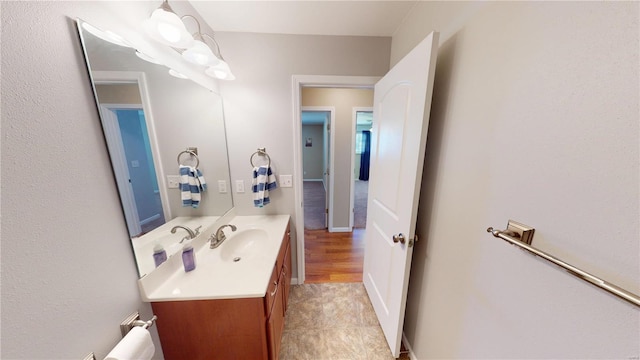 bathroom featuring vanity and tile patterned flooring