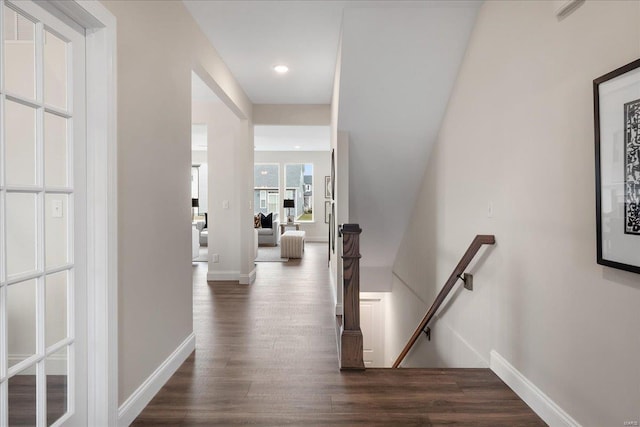 513 Beneficial Way, Saint Charles, MO 63304 - hallway with an upstairs landing, wood finished floors, baseboards, and recessed lighting