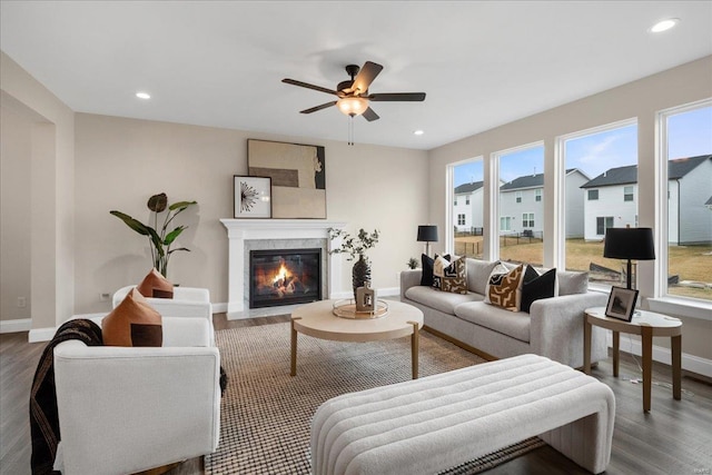 513 Beneficial Way, Saint Charles, MO 63304 - living room with wood finished floors, healthy amount of natural light, ceiling fan, baseboards, and recessed lighting