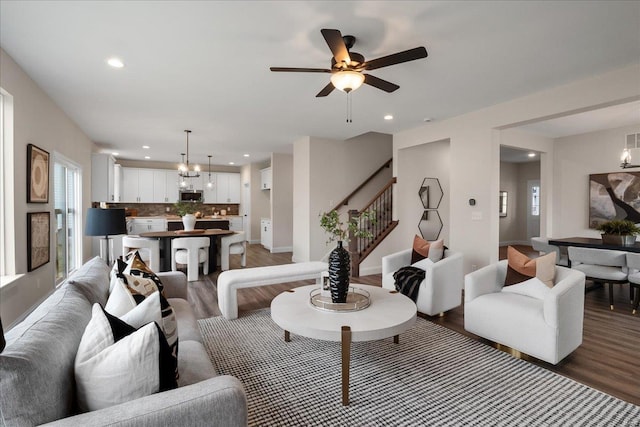 513 Beneficial Way, Saint Charles, MO 63304 - living area with light wood-style floors, recessed lighting, stairs, ceiling fan, and baseboards