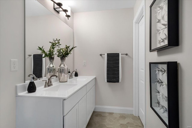 513 Beneficial Way, Saint Charles, MO 63304 - bathroom with double vanity and baseboards