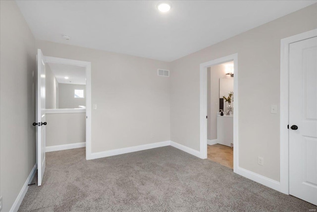 513 Beneficial Way, Saint Charles, MO 63304 - unfurnished bedroom featuring carpet, baseboards, and recessed lighting