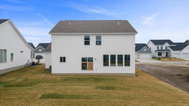 513 Beneficial Way, Saint Charles, MO 63304 - back of house featuring a lawn