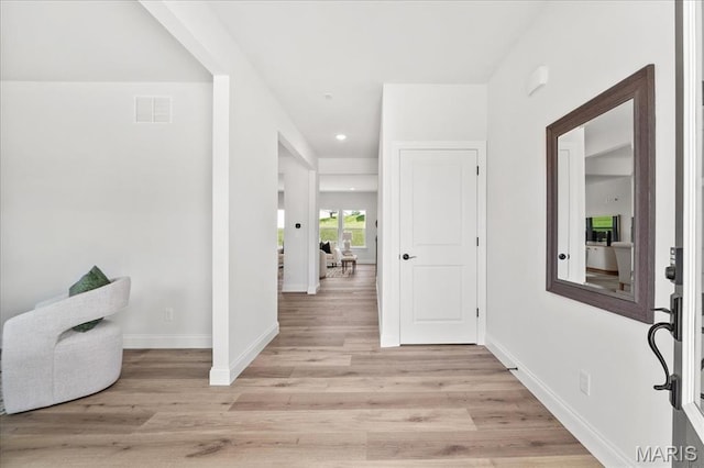 513 Beneficial Way, Saint Charles, MO 63304 - entryway with light wood-style flooring, baseboards, and recessed lighting