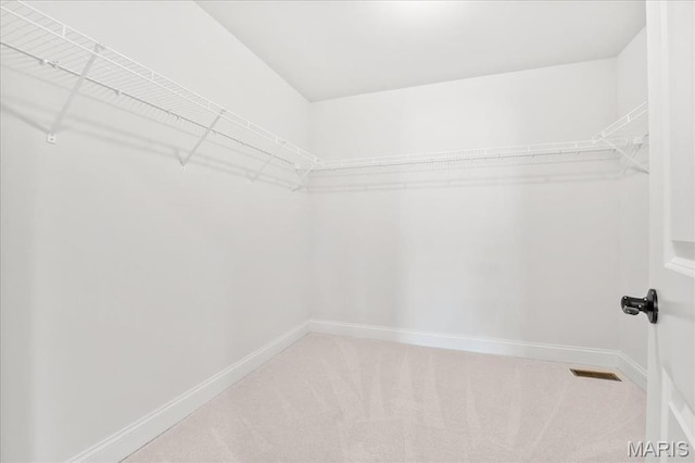 513 Beneficial Way, Saint Charles, MO 63304 - walk in closet with carpet floors