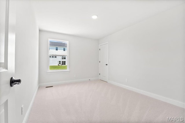 513 Beneficial Way, Saint Charles, MO 63304 - empty room with baseboards and carpet flooring