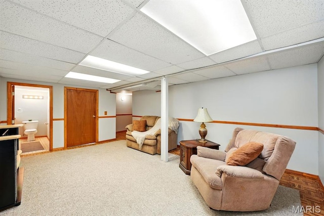 4355 Toenges Ave, Saint Louis, MO 63116 - sitting room featuring a drop ceiling and baseboards