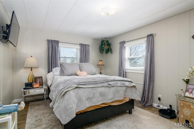 2 S Circle Dr, Carlyle, IL 62231 - bedroom with wood finished floors and a decorative wall