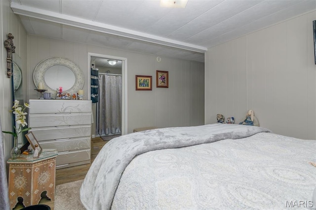 2 S Circle Dr, Carlyle, IL 62231 - bedroom featuring wood finished floors and beamed ceiling