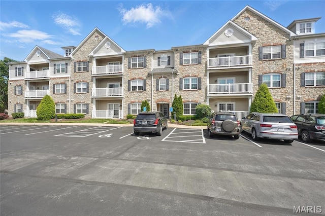 2 Monarch Trace Ct Unit 305, Chesterfield, MO 63017 - view of apartment building / complex with uncovered parking