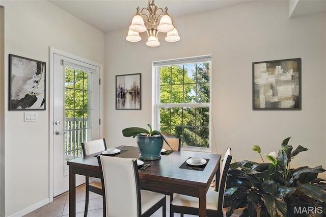 2 Monarch Trace Ct Unit 305, Chesterfield, MO 63017 - tiled dining area featuring a chandelier and baseboards