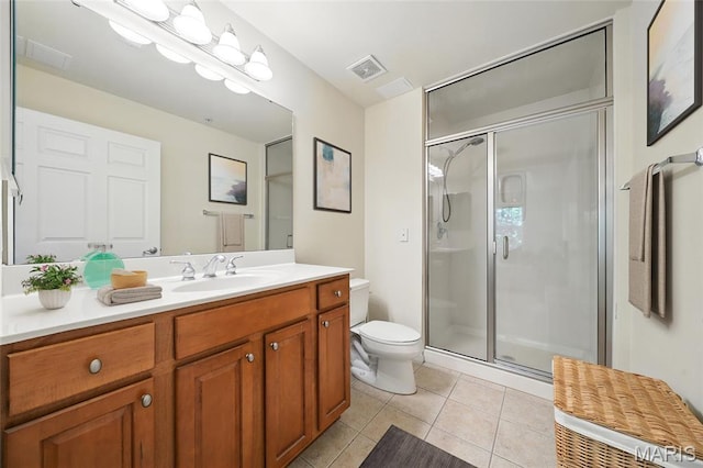 2 Monarch Trace Ct Unit 305, Chesterfield, MO 63017 - bathroom featuring tile patterned flooring, toilet, a stall shower, and vanity