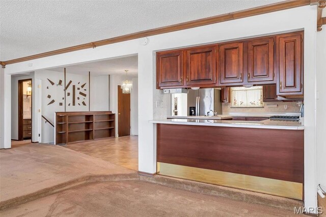 6072 Kingsway, House Springs, MO 63051 - kitchen featuring stainless steel refrigerator with ice dispenser, ornamental molding, light colored carpet, light countertops, and a textured ceiling