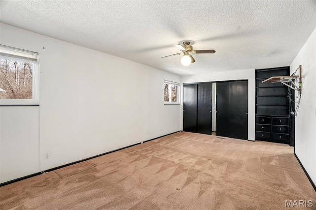 6072 Kingsway, House Springs, MO 63051 - unfurnished bedroom featuring carpet flooring, a textured ceiling, and a ceiling fan