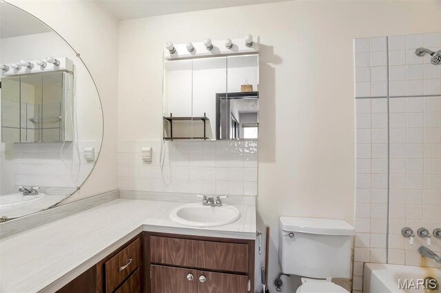 6072 Kingsway, House Springs, MO 63051 - bathroom with toilet, vanity, tasteful backsplash, and shower / bathtub combination