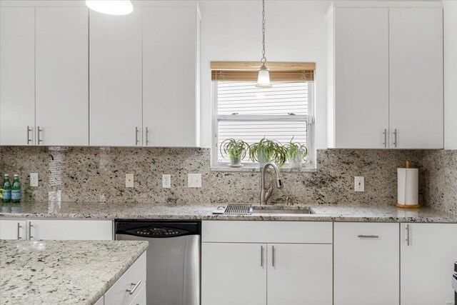 9 Amber Ridge Ct, High Ridge, MO 63049 - kitchen featuring stainless steel dishwasher, a sink, and white cabinets