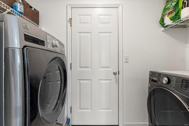 9 Amber Ridge Ct, High Ridge, MO 63049 - clothes washing area with independent washer and dryer