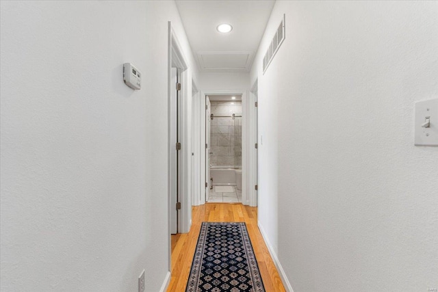 9 Amber Ridge Ct, High Ridge, MO 63049 - corridor with light wood-style floors, attic access, and recessed lighting