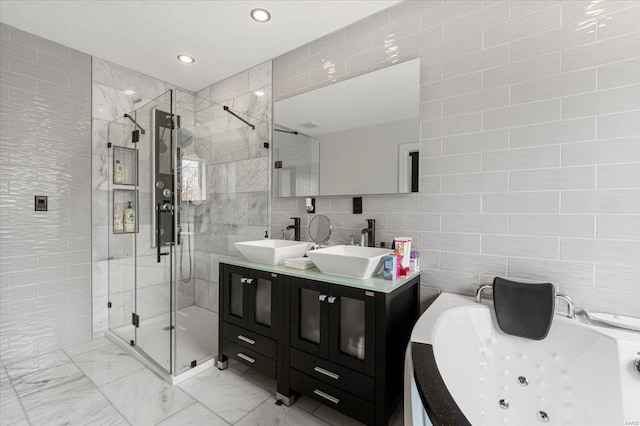 9 Amber Ridge Ct, High Ridge, MO 63049 - bathroom with tile walls, marble finish floors, a shower stall, a whirlpool tub, and double vanity