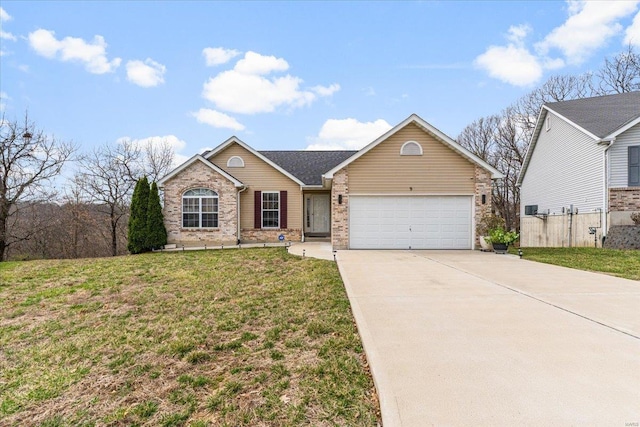 9 Amber Ridge Ct, High Ridge, MO 63049 - view of front of home featuring a garage, concrete driveway, and brick siding
